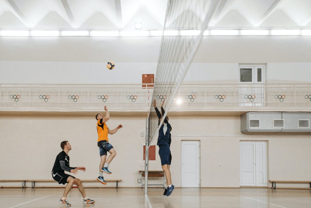 Men playing volleyball