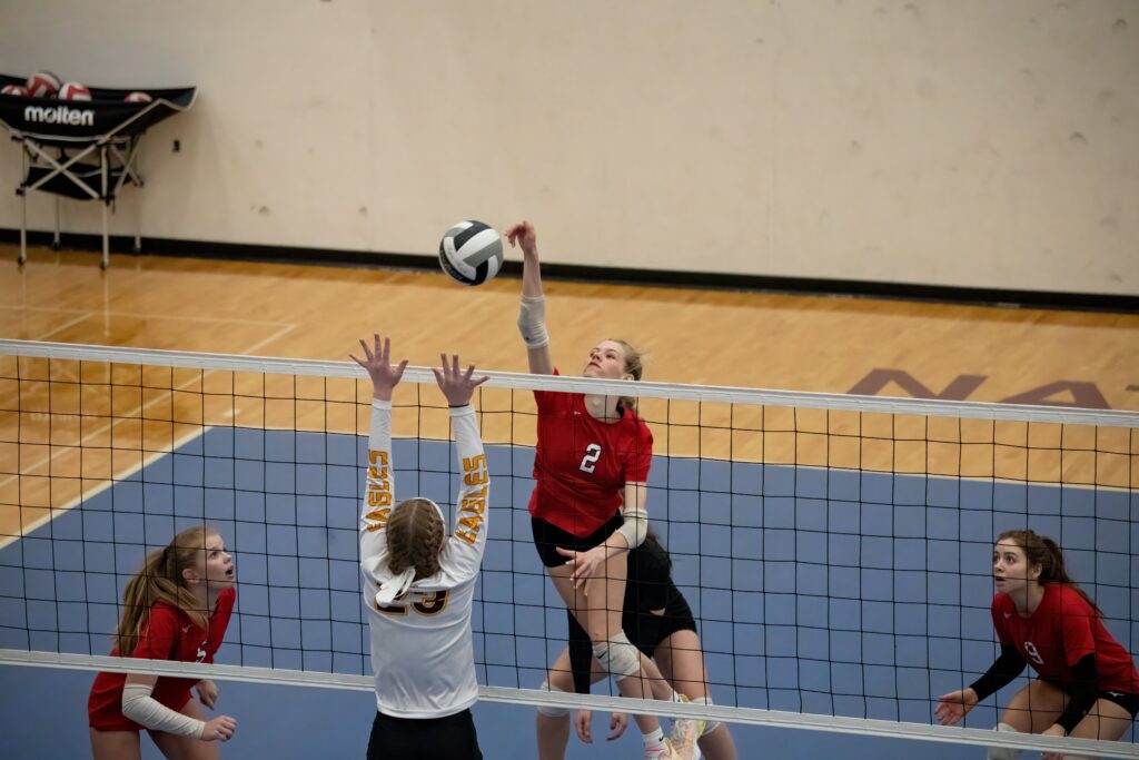 Women playing volleyball